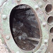 JB113  Inside the boiler showing the fire tubes that would have been surrounded by heated water with steam in the chest above them (to the left).